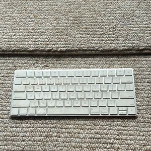 Apple White Slim Laptop Keyboard with QWERTY Layout and Minimal Travel Keys